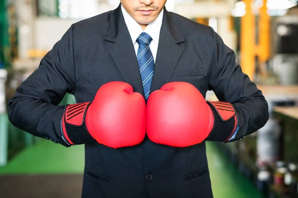 Red boxing gloves of factory businessman — Stock Photo, Image