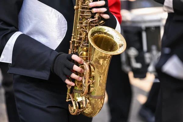 Closeup marching school band with horn music instrument. Parade of Musician teamwork concept.