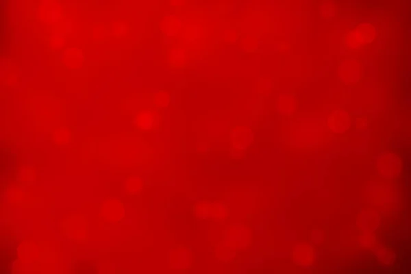 赤の抽象的な光沢のあるクリスマス ライトの背景 — ストック写真