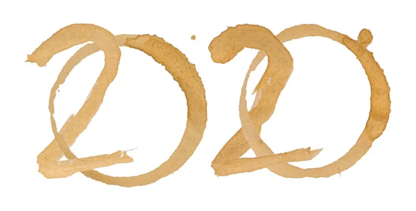 文字2020字母是由咖啡污渍制成的 在白色背景下被分离出来 — 图库照片