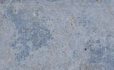 Çatlaklı ve endüstriyel lekeli Grunge mavi beton duvarı
