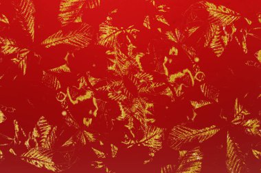 Kırmızı, altın desenli yüzey. Metin veya tasarım için renkli grunge arkaplanı.