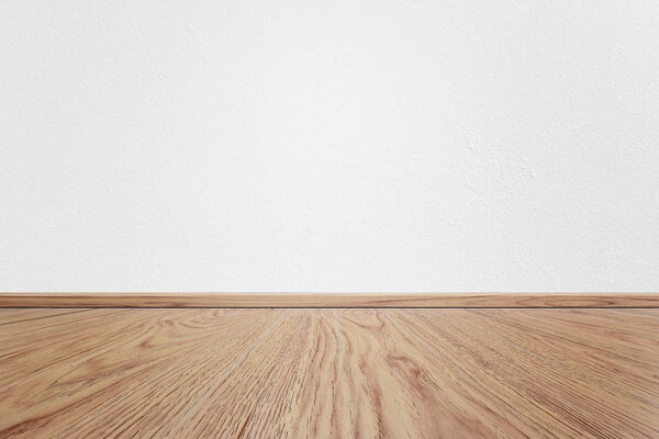 Пустой интерьер комнаты с белой текстурой цементной стены и коричневым деревянным узором пола. Концепция интерьера винтажного стиля