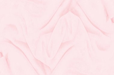 Güzel pembe kumaş dokusu arkaplanının yakın çekimi.