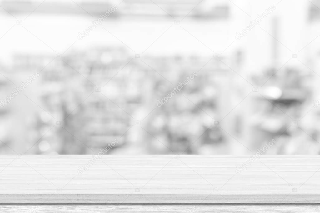 Empty white table top, counter over blur white bokeh light background. Empty wood shelf for product display, banner or mockup.