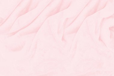 Güzel pembe kumaş dokusu arkaplanının yakın çekimi.