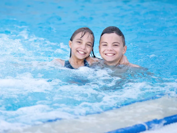 Children in pool — Stock Photo, Image