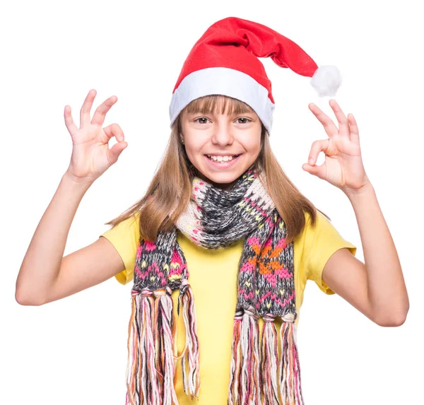 Roztomilá dívka, která nosí Santa Claus klobouk — Stock fotografie