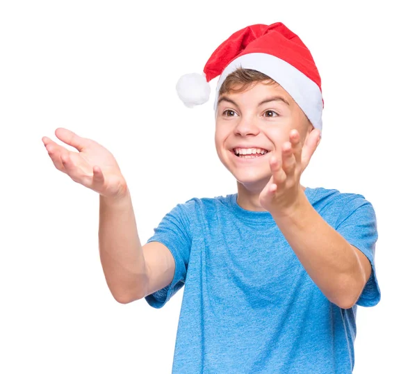 サンタ クロースの帽子を身に着けている十代の少年 — ストック写真