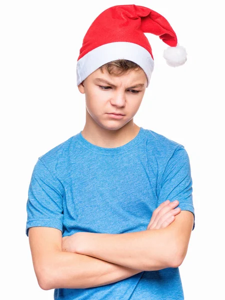 Dospívající chlapec klobouk Santa Claus — Stock fotografie