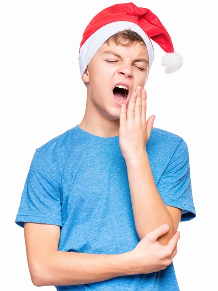 Teen boy wearing Santa Claus hat — Stock Photo, Image