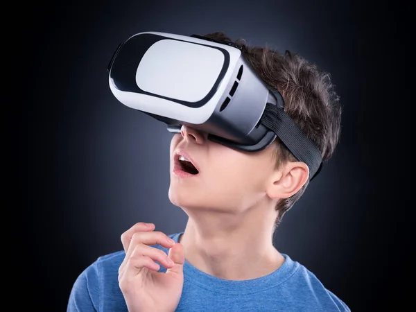 Teen boy in VR glasses — Stock Photo, Image