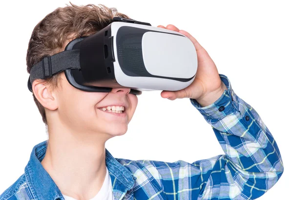 Teen boy in VR glasses — Stock Photo, Image