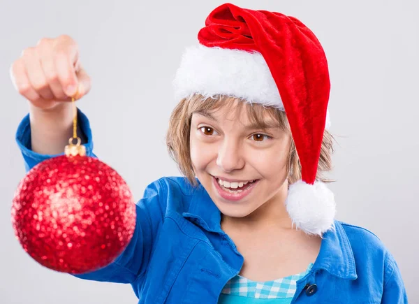 Klein meisje in Kerstman hoed — Stockfoto