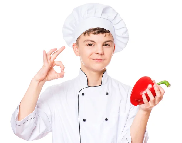 Dospívající chlapec nošení uniformě kuchař — Stock fotografie