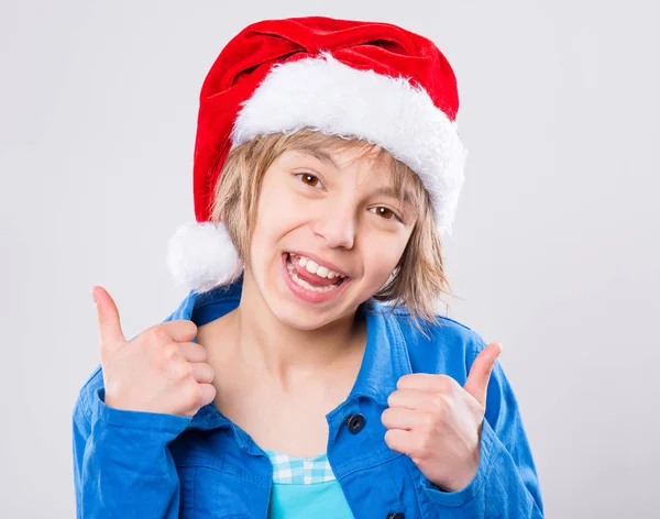 Petite fille en chapeau de Père Noël — Photo