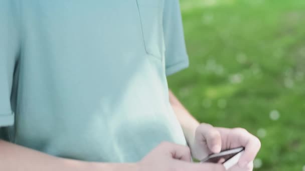 Teen boy in city park — Stock Video