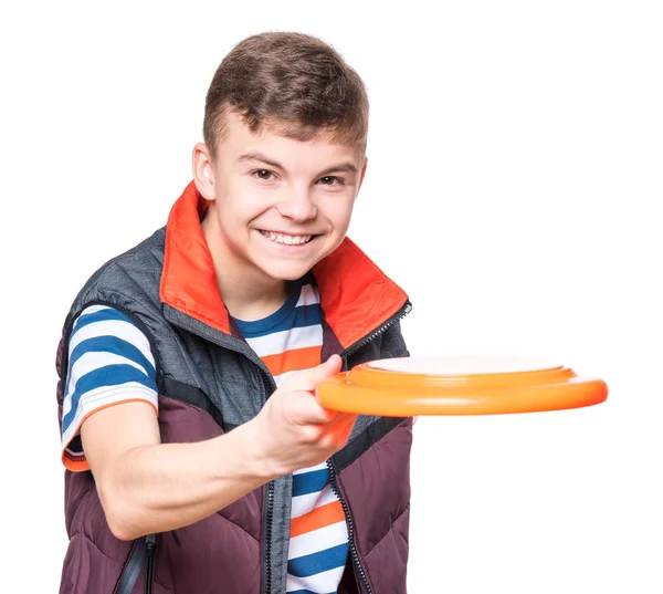 Підліток хлопчик з літаючим диском — стокове фото