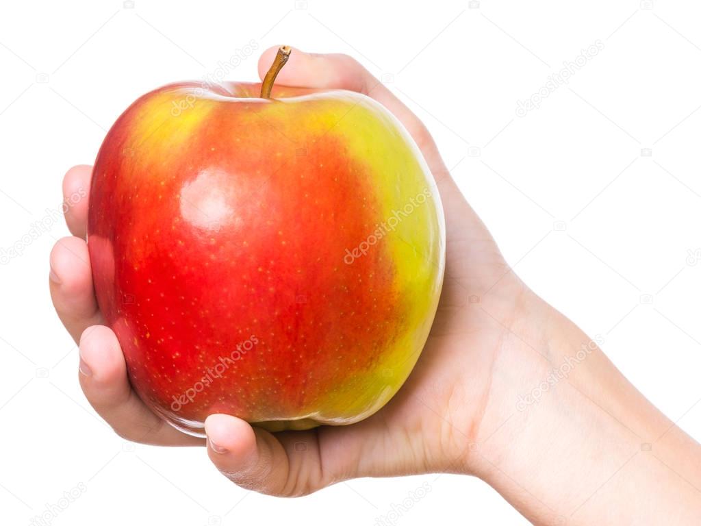 hand with fresh apple