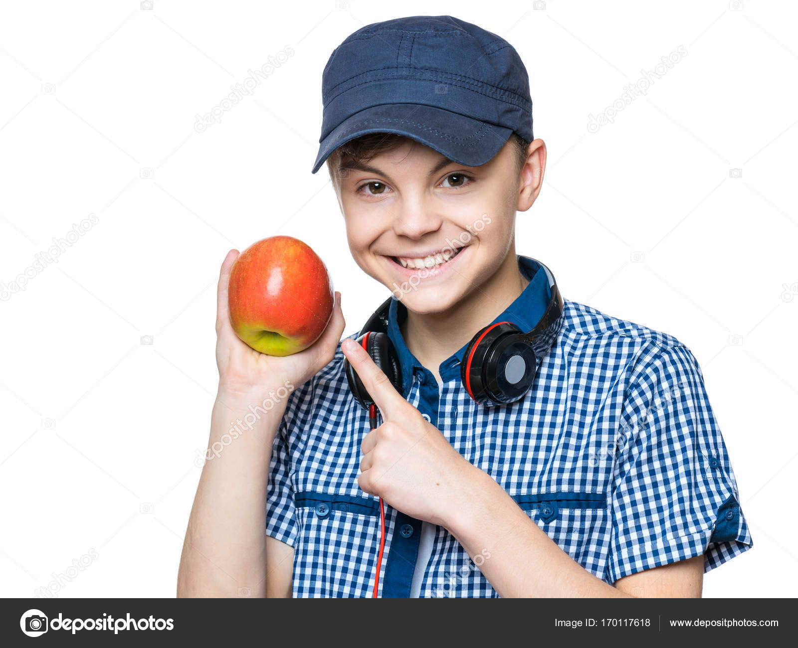 Adolescent garçon avec casquette et écouteurs image libre de droit