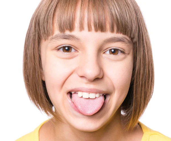 Menina mostrando sua língua — Fotografia de Stock