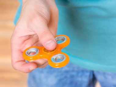 El tutmak Spinner oyuncak