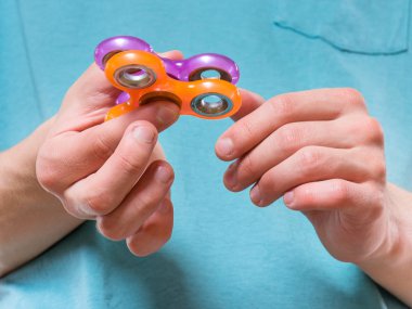 El tutmak Spinner oyuncak