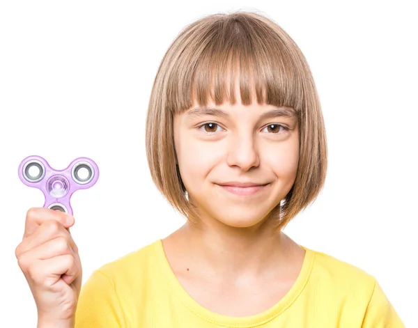 Little girl with spinner toy — Stock Photo, Image