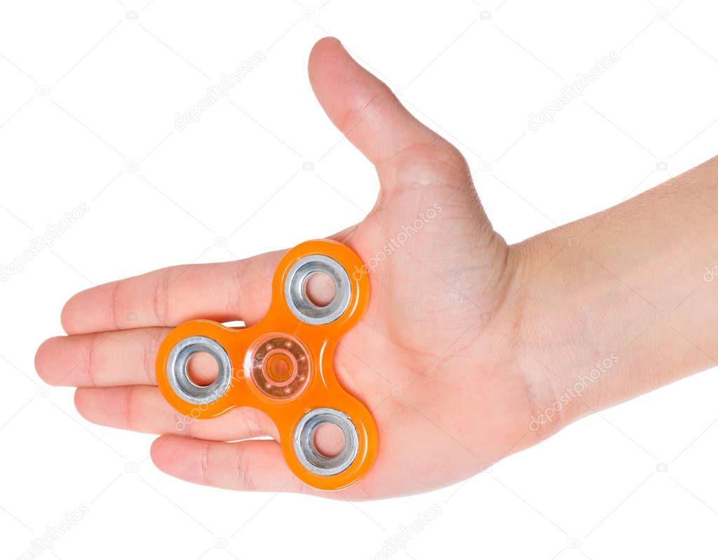 Hand holding spinner toy