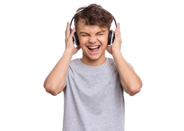 Adolescente chico con auriculares — Foto de Stock