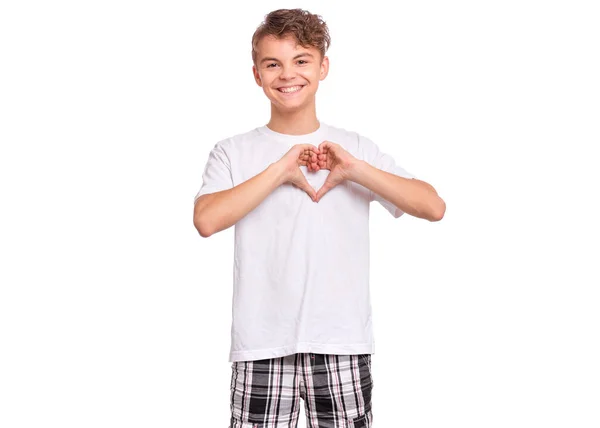 Adolescente menino fazendo coração mãos — Fotografia de Stock