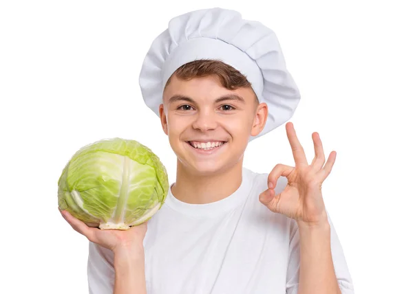 Подросток в шляпе шеф-повара — стоковое фото