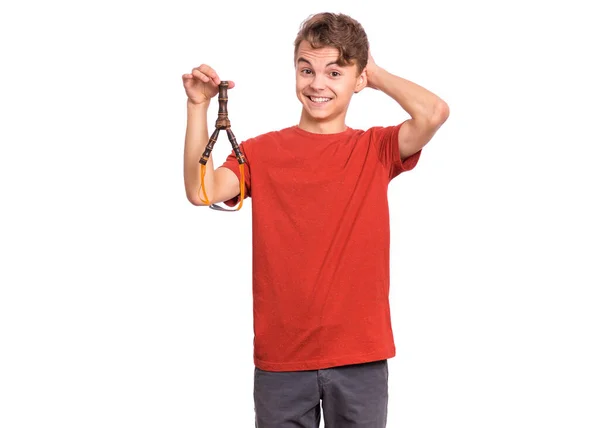 Portrait Puzzled Teen Boy Holding Slingshot Hands Isolated White Background — Stock Photo, Image