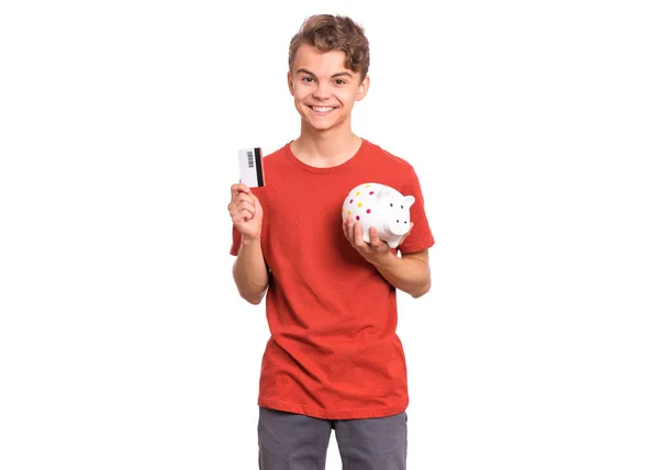 Portrait Happy Teen Boy Holding Credit Card Piggy Bank Isolated — Stok fotoğraf