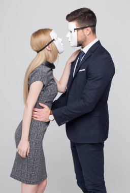 Young man and woman in mask flirting clipart