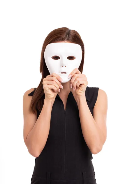 Young woman holding white mask in front of face portrait isolate — Stock Photo, Image