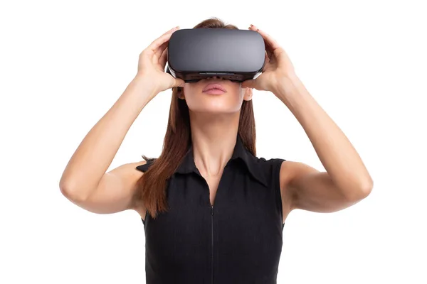 Young woman using and holding VR headset on head, isolated — Stock Photo, Image