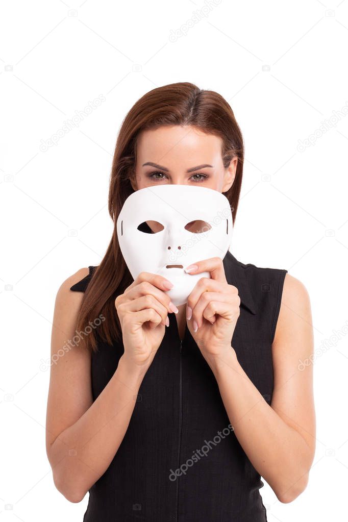 Young woman taking off mask from face isolated