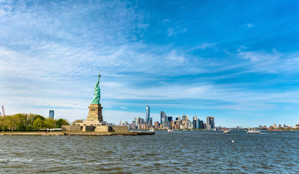 The statue of Liberty and Manhattan in New York City, USA