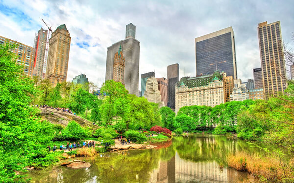 Central Park with the Pond and Manhattan Skyline - New York City, United States