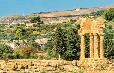 The Temple of Castor and Pollux at the Valley of the Temples in Agrigento - Sicily, Italy clipart