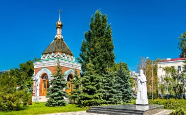 Alexius Chapel and statue of Sergius of Radonezh in Samara, Russia clipart