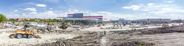 Panoramic view of a landscape transform into urban area — Stock Photo, Image