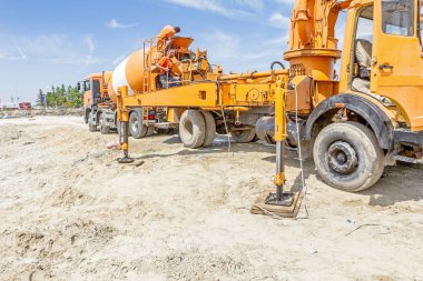 Concrete transport at the building site. clipart