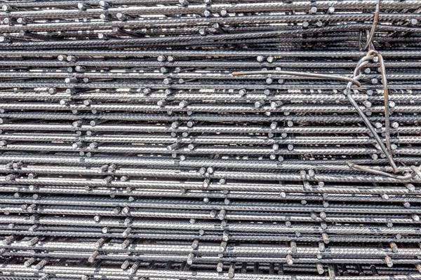 Pile of new metal reinforcing mesh, armature