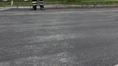 Buharlı silindir yayılan, sıcak asfalt flatting.