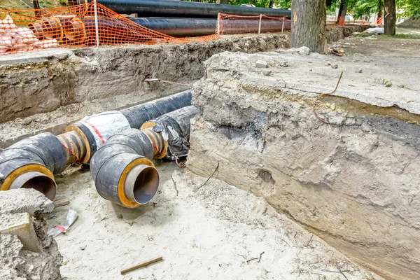 Isolated pipeline placed in trench — Stock Photo, Image