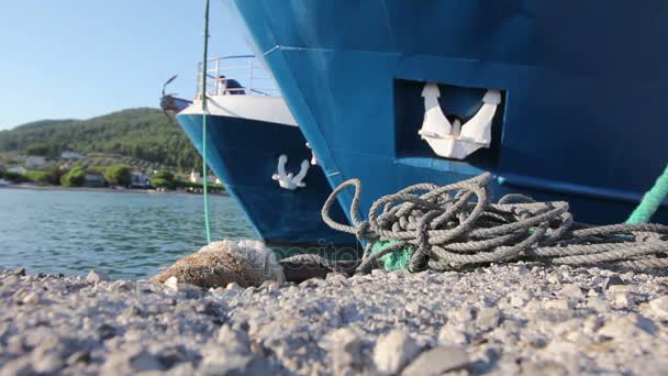 Two big fishing boats are tied up with rope for the dock, marina — Stock Video