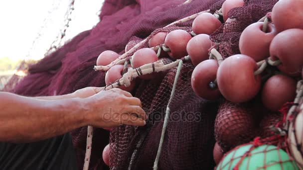 Needle with thread in fisherman hands repairing net for angling. — Stock Footage Needle Thread Fisherman Hands Repairing Net Angling Royalty Free Stock Footage