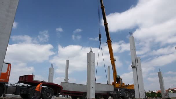 Mobile Crane Lifting Concrete Joist Mobile Crane Unloading Concrete Joist — Stock Video